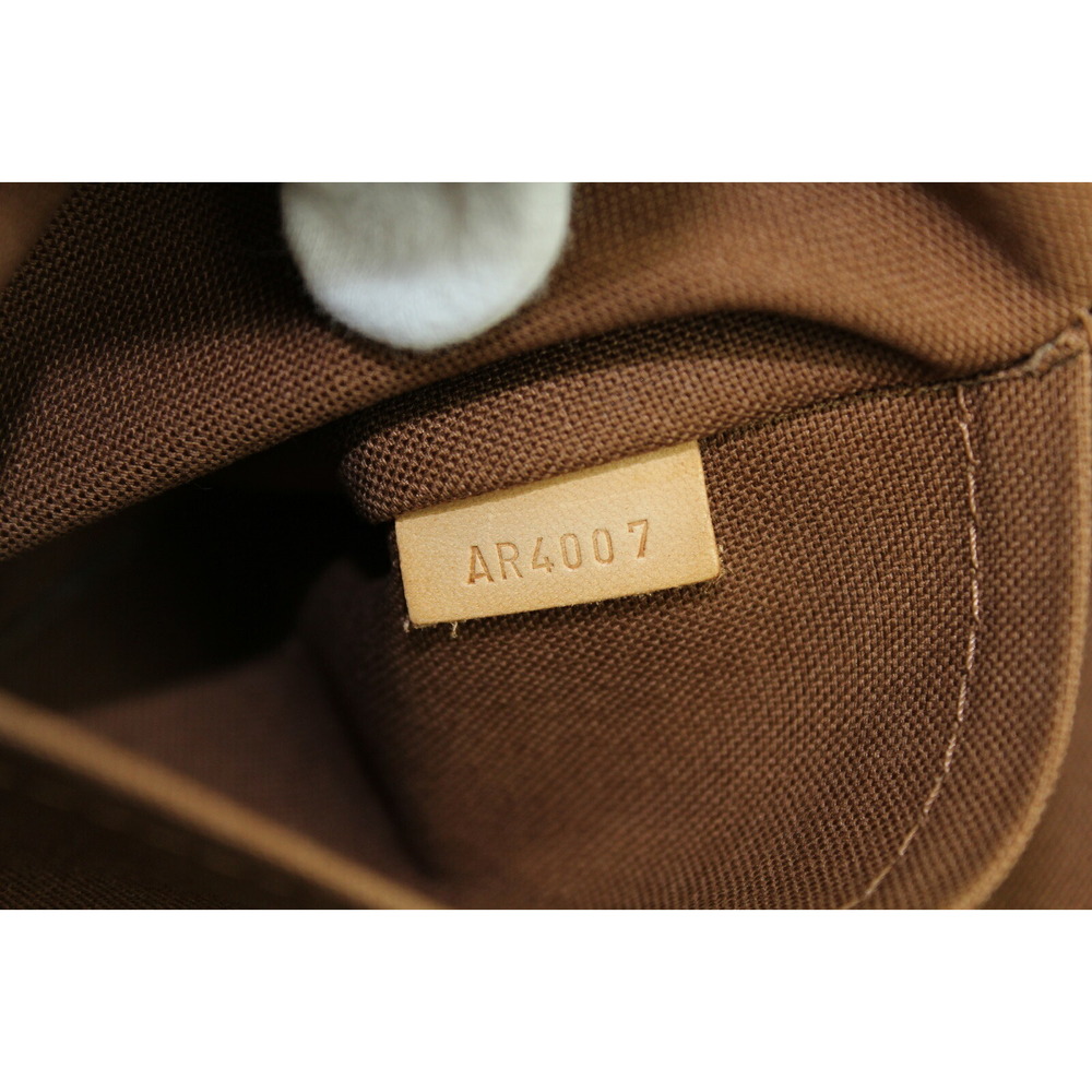 LOUIS VUITTON Tivoli Monogram Handbag - Picture 7 of 7